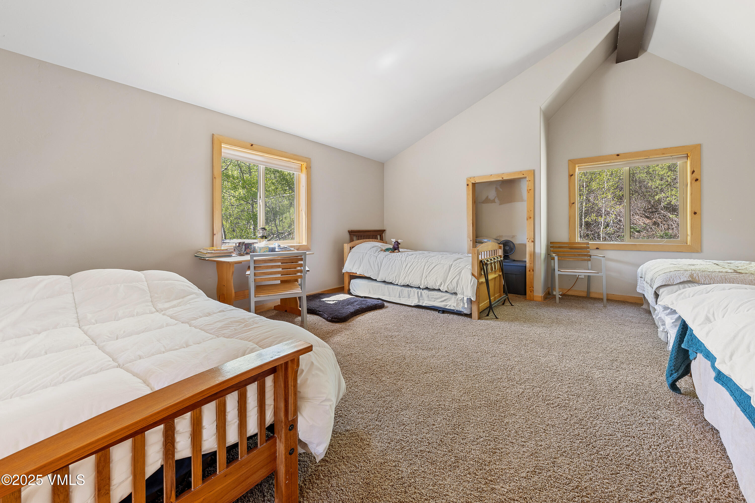 320 Mill Eagle Co 81631 Eagle, CO 81631 - Photo 26 of 33 a bedroom with two beds and a couch