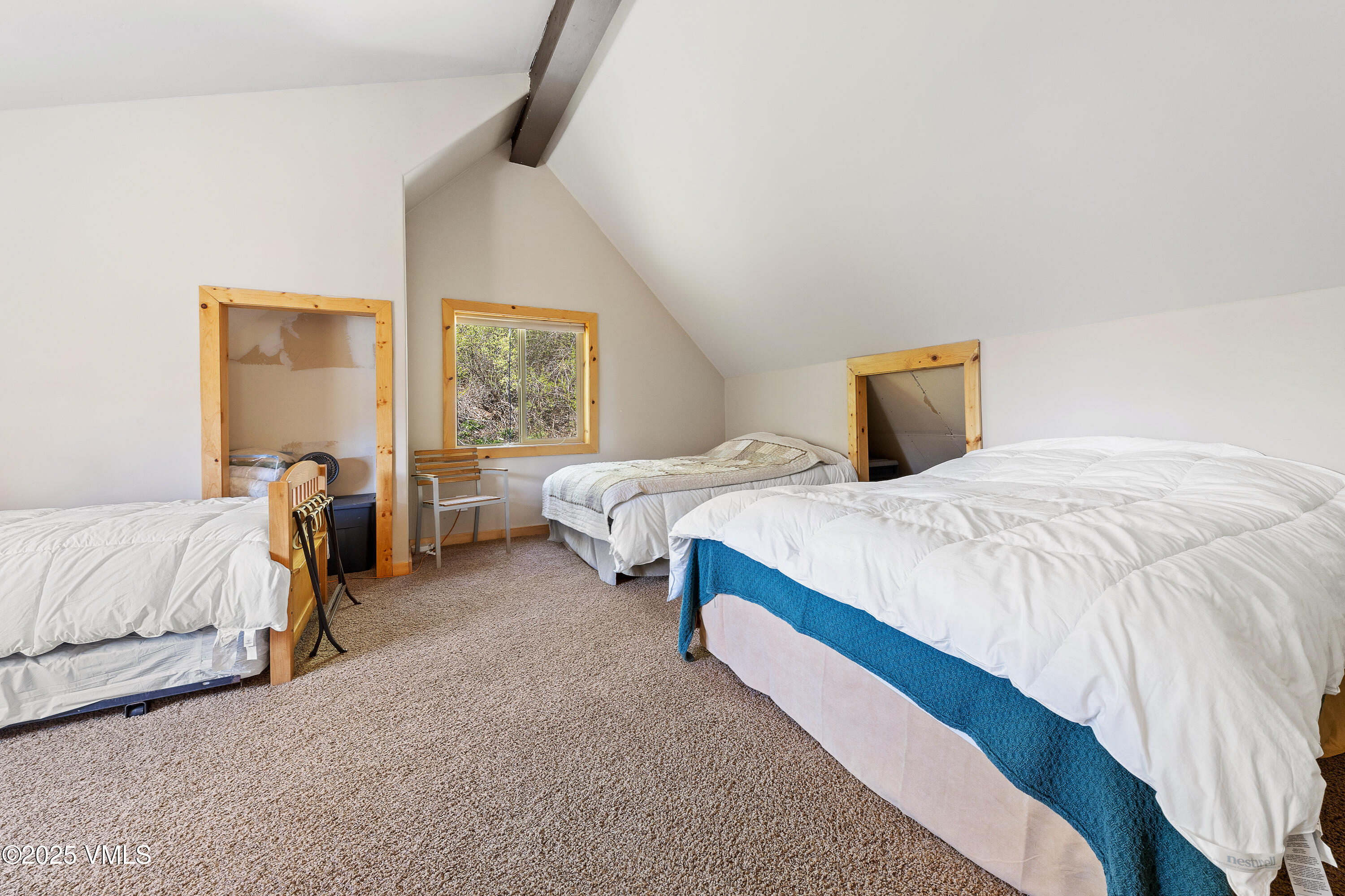 320 Mill Eagle Co 81631 Eagle, CO 81631 - Photo 27 of 33 a bed room with a bed and a night stand