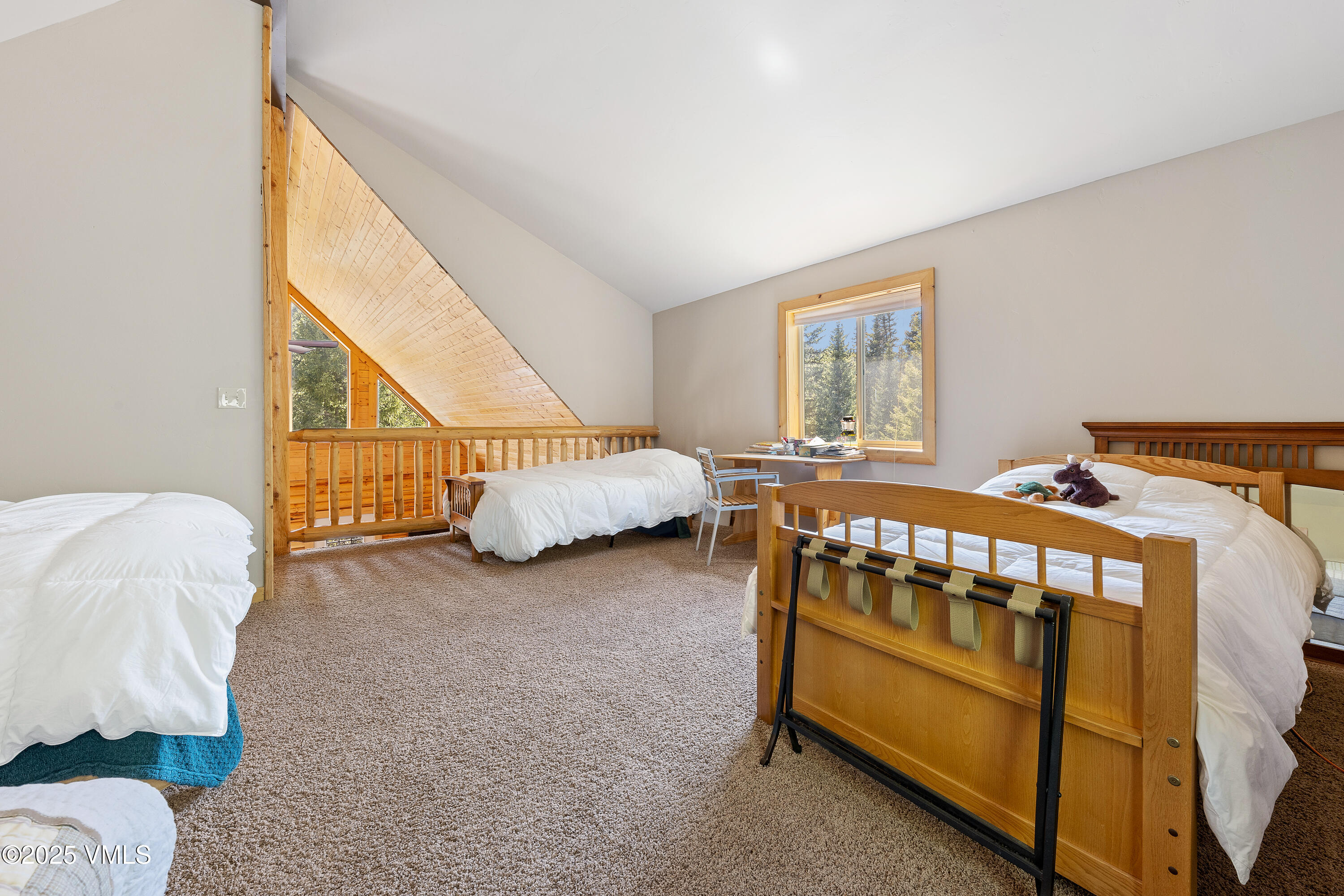 320 Mill Eagle Co 81631 Eagle, CO 81631 - Photo 28 of 33 a bedroom with bed and a window