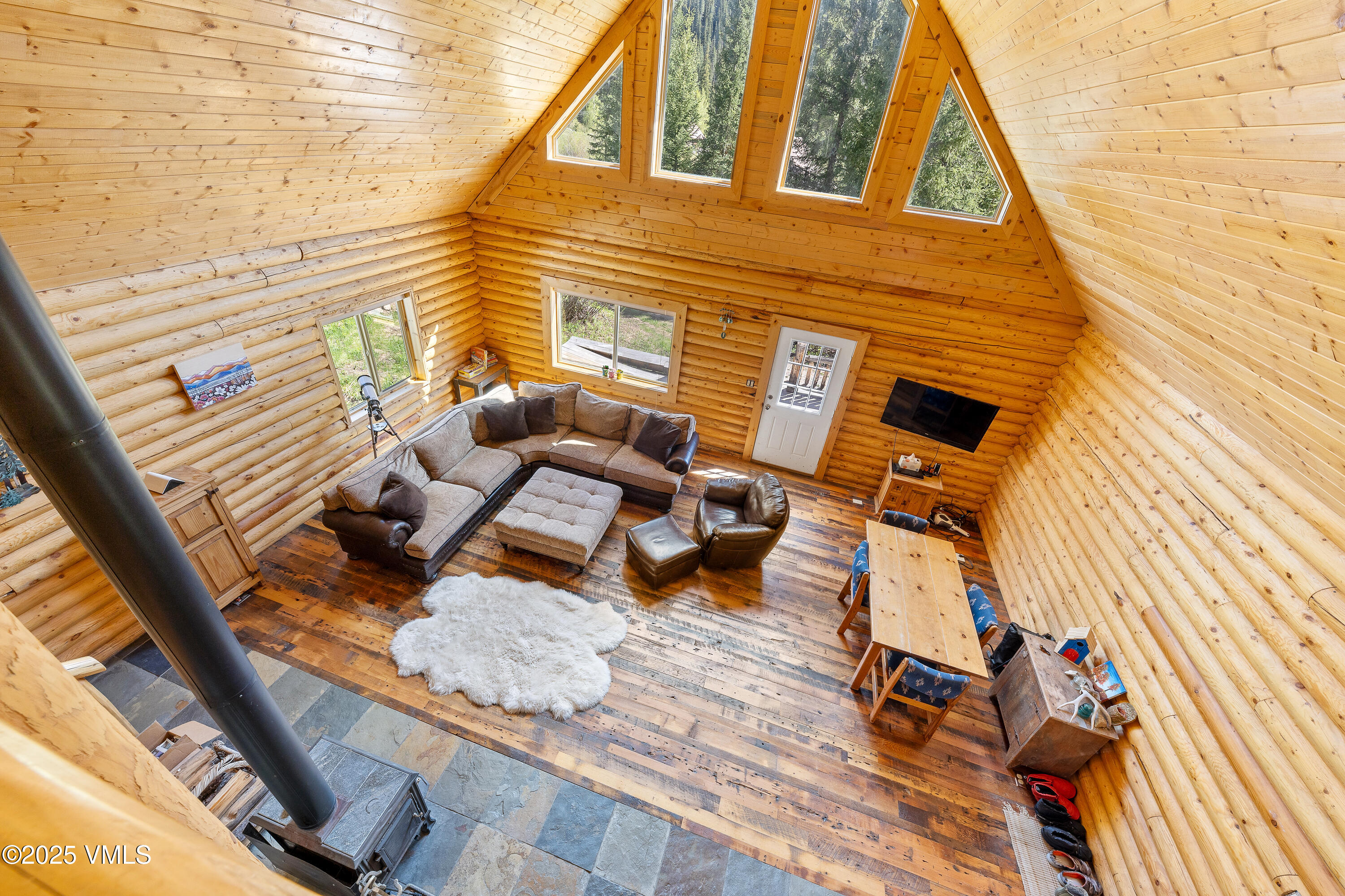 320 Mill Eagle Co 81631 Eagle, CO 81631 - Photo 30 of 33 a view of a balcony with chairs and wooden floor