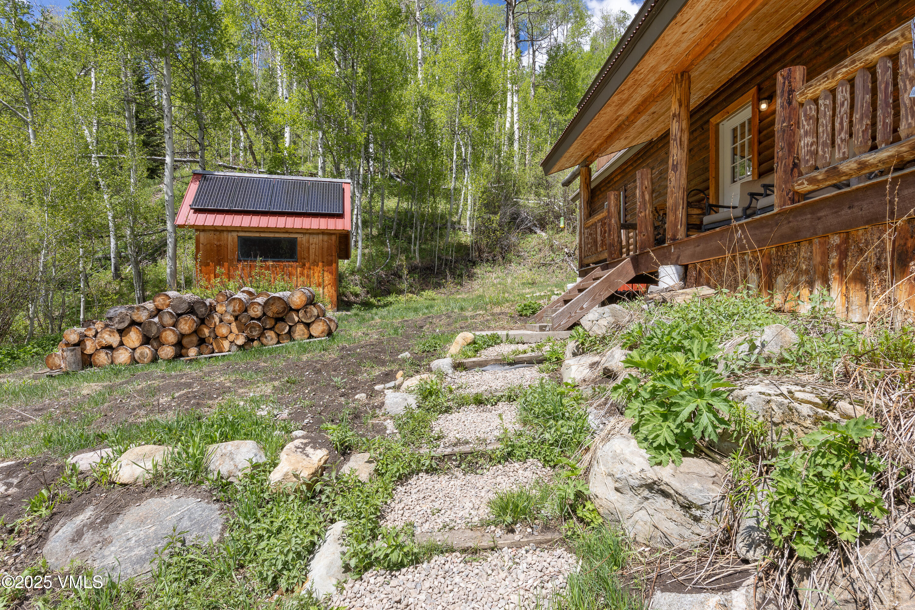 320 Mill Eagle Co 81631 Eagle, CO 81631 - Photo 3 of 33 a view of a house with a yard