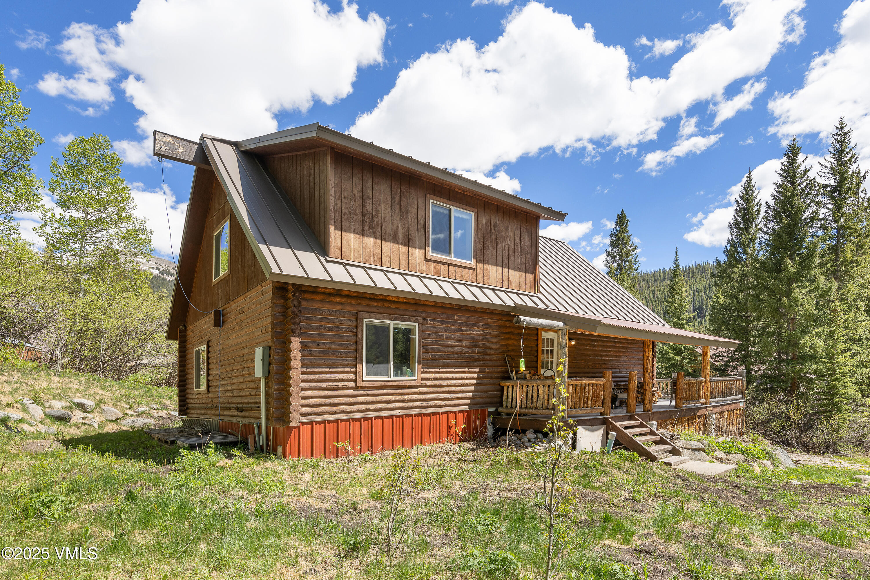 320 Mill Eagle Co 81631 Eagle, CO 81631 - Photo 6 of 33 a backyard of a house with table and chairs