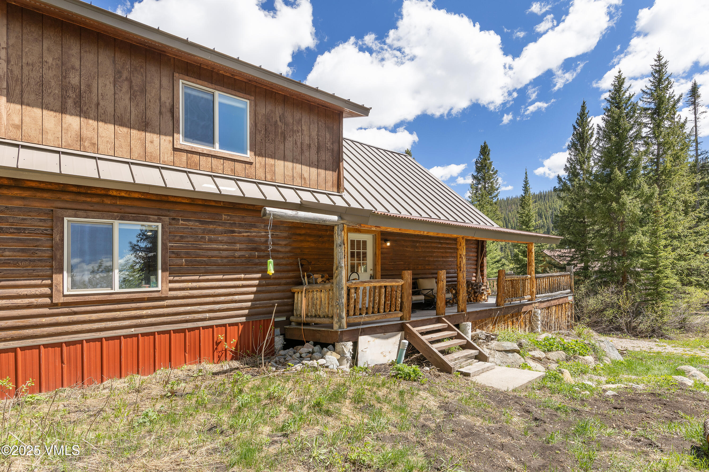 320 Mill Eagle Co 81631 Eagle, CO 81631 - Photo 7 of 33 a view of a house with a yard and wooden fence