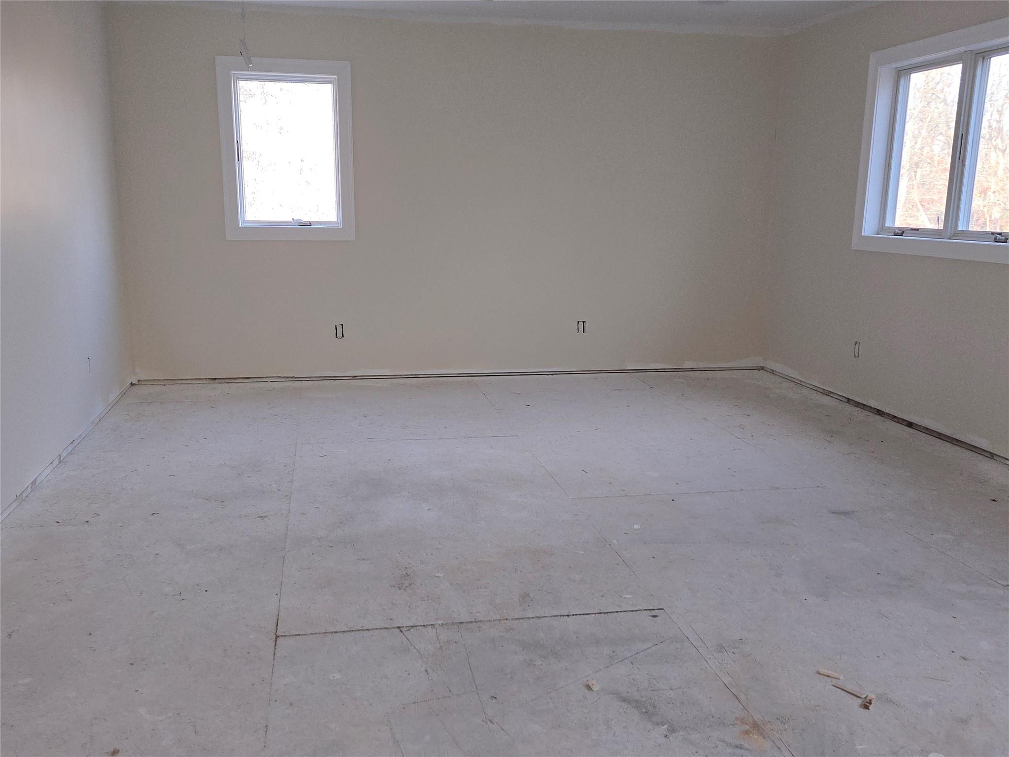 85 Smith Road Ridge, NY 11961 - Photo 22 of 26 Unfurnished room featuring healthy amount of natural light