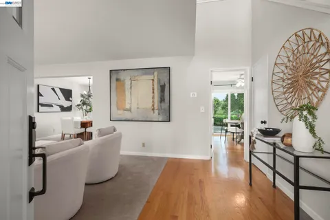 a living room with furniture and a table