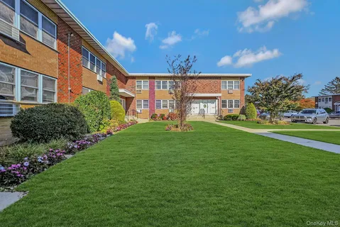 a garden view with a seating space