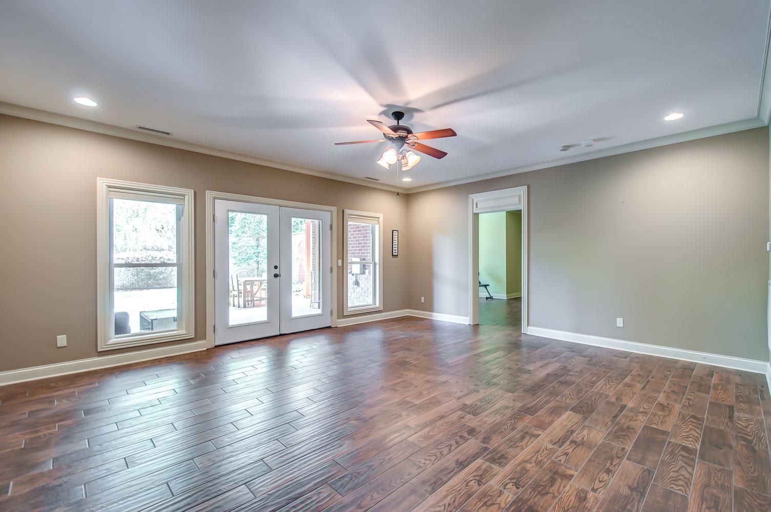 476 Sandcastle Road Franklin, TN 37069 - Photo 19 of 23 a view of an empty room with window and wooden floor