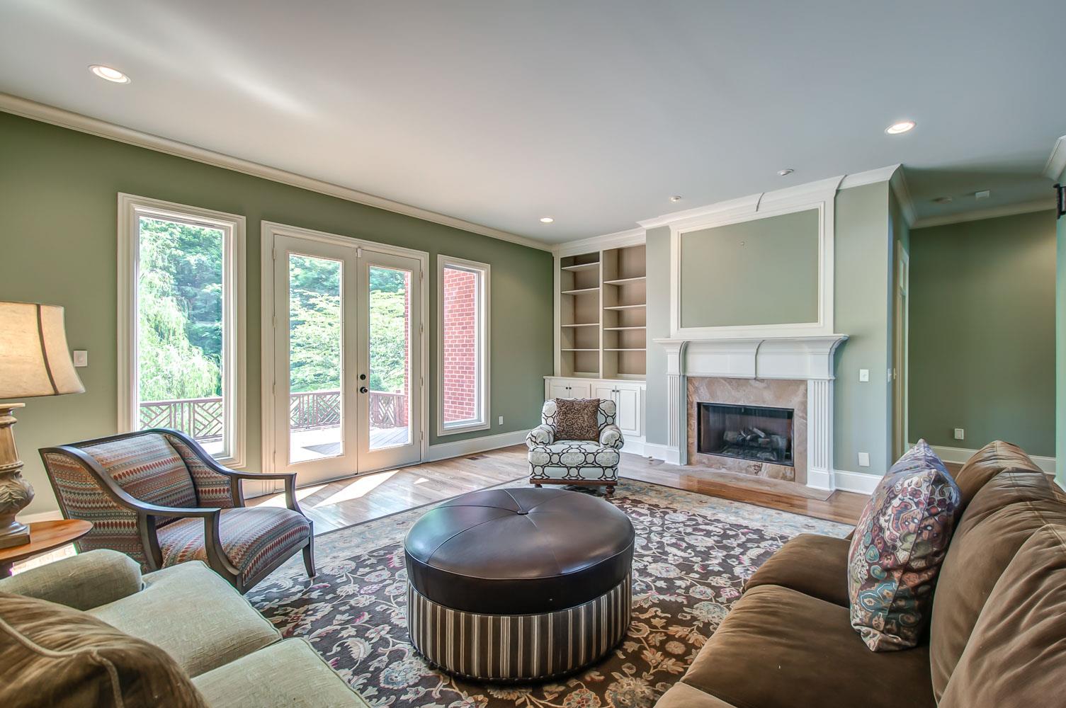 476 Sandcastle Road Franklin, TN 37069 - Photo 6 of 23 a living room with furniture and a fireplace