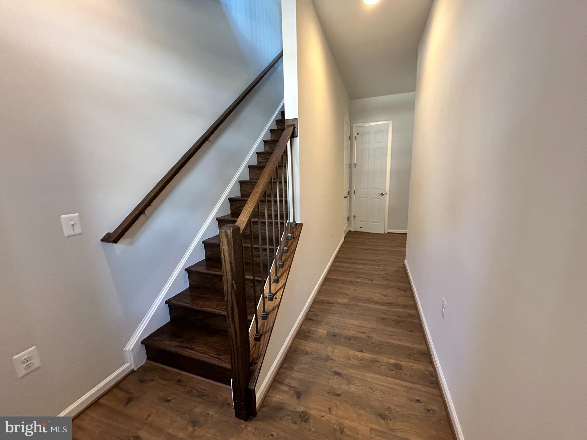 9370 Crestview Rdg Drive Bristow, VA 20136 - Photo 5 of 31 a view of a hallway with wooden floor and entryway