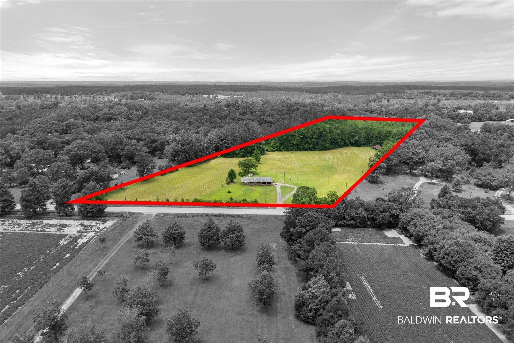 11601 Lott Road Chunchula, AL 36521 - Photo 29 of 34 Aerial view of sparsely populated area featuring a heavily wooded area