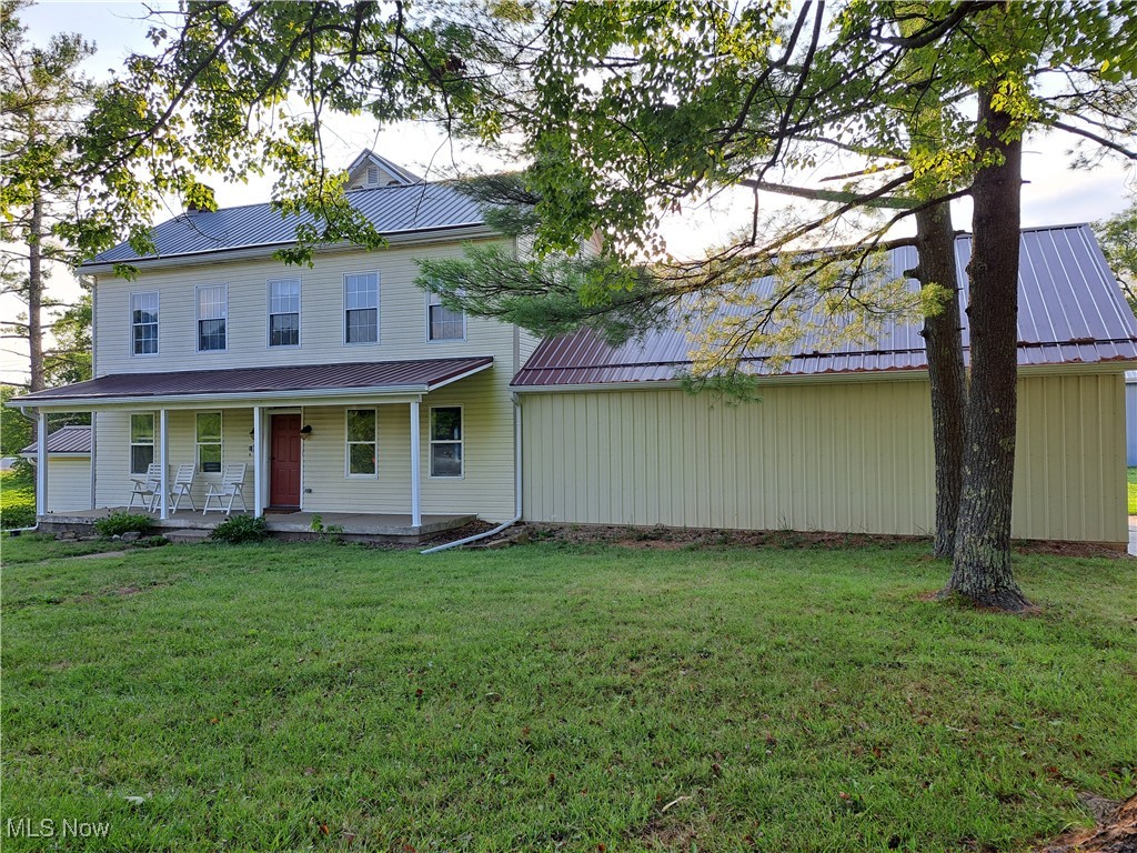49197 John Tomcho Road Cumberland, OH 43732 - Photo 2 of 50 View of front of property with a front yard
