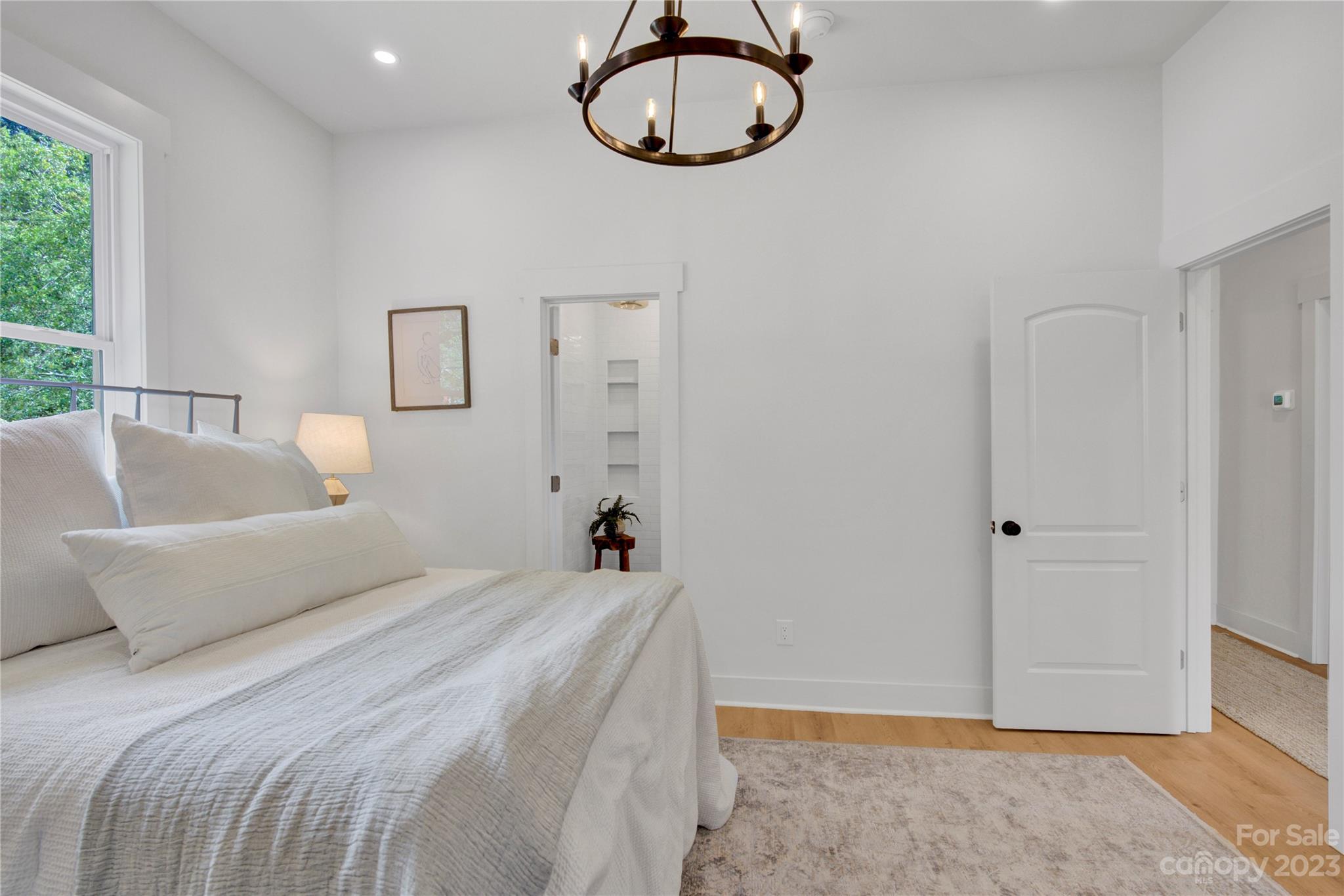 115 Ashe Street York, SC 29745 - Photo 18 of 33 a bedroom with a bed and a window