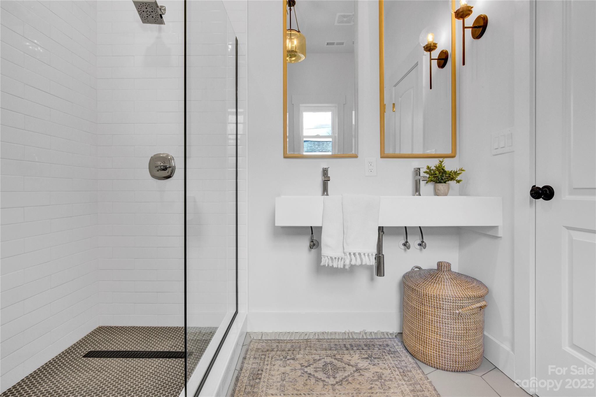 115 Ashe Street York, SC 29745 - Photo 21 of 33 a bathroom with a sink and a mirror