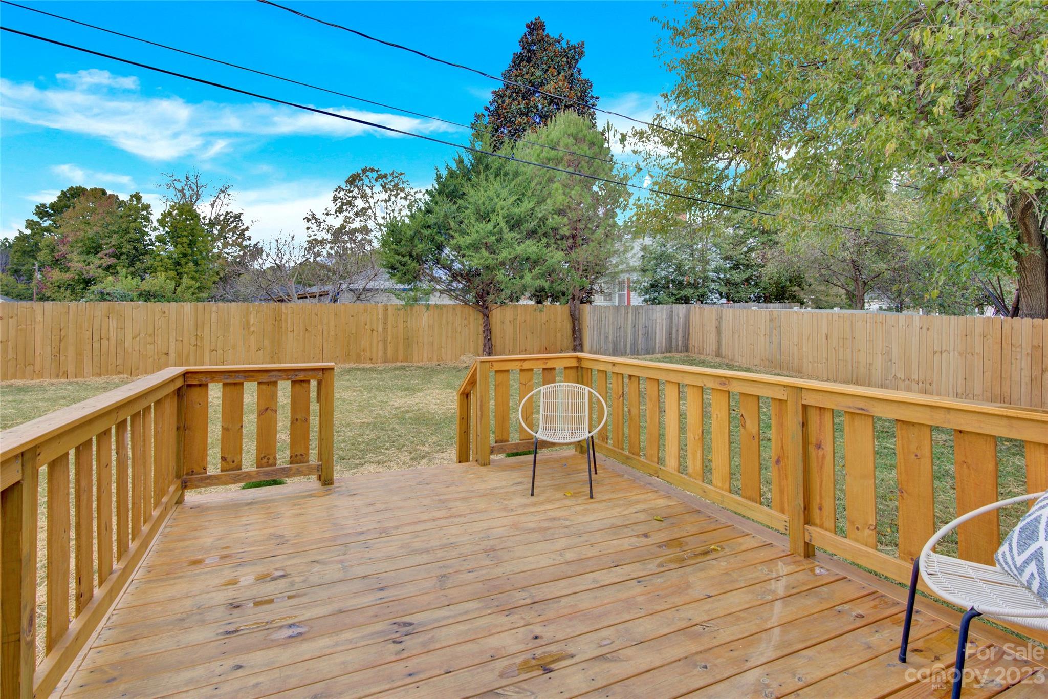 115 Ashe Street York, SC 29745 - Photo 26 of 33 a view of deck with two chairs and wooden floor