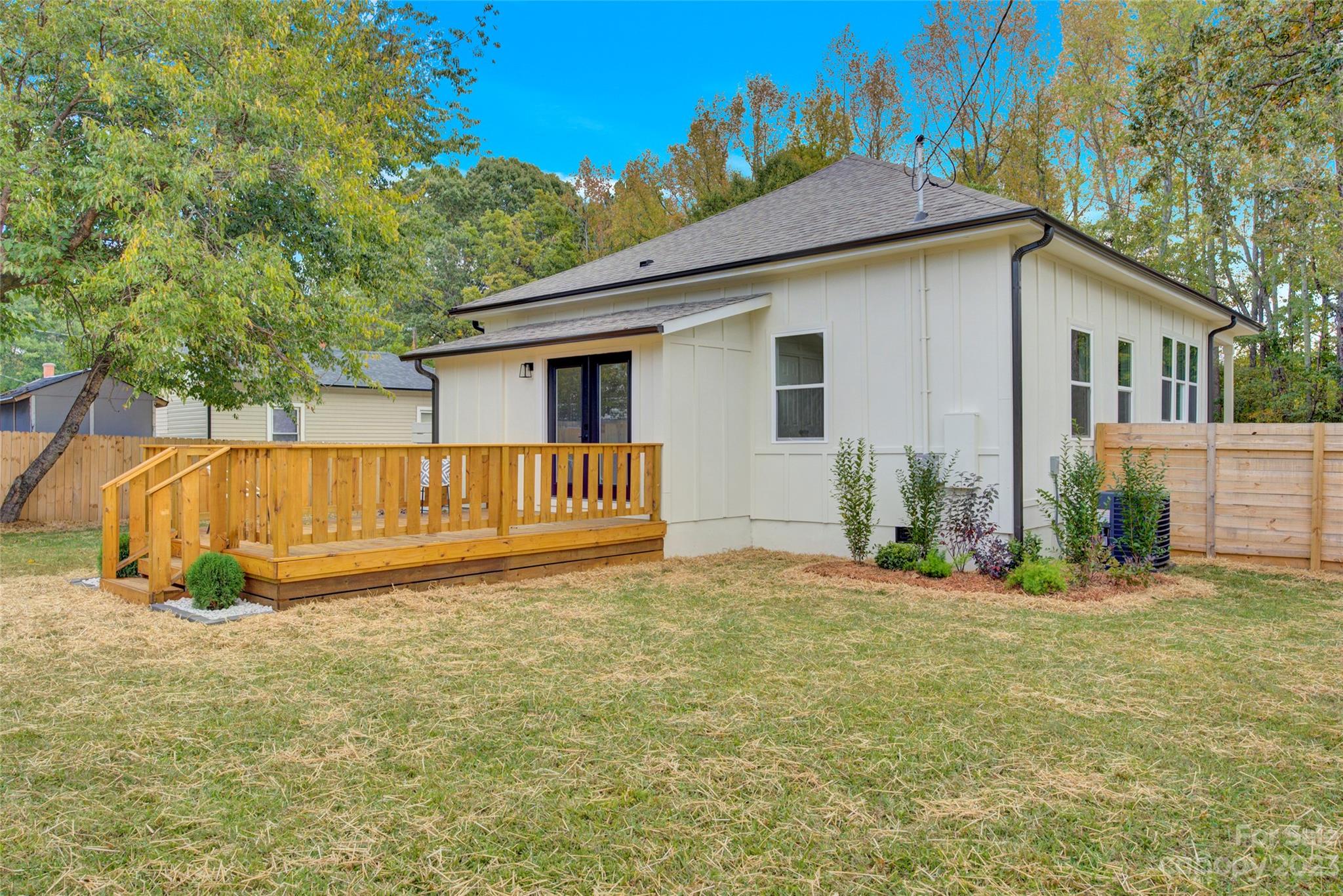 115 Ashe Street York, SC 29745 - Photo 31 of 33 a view of a house with backyard and trees