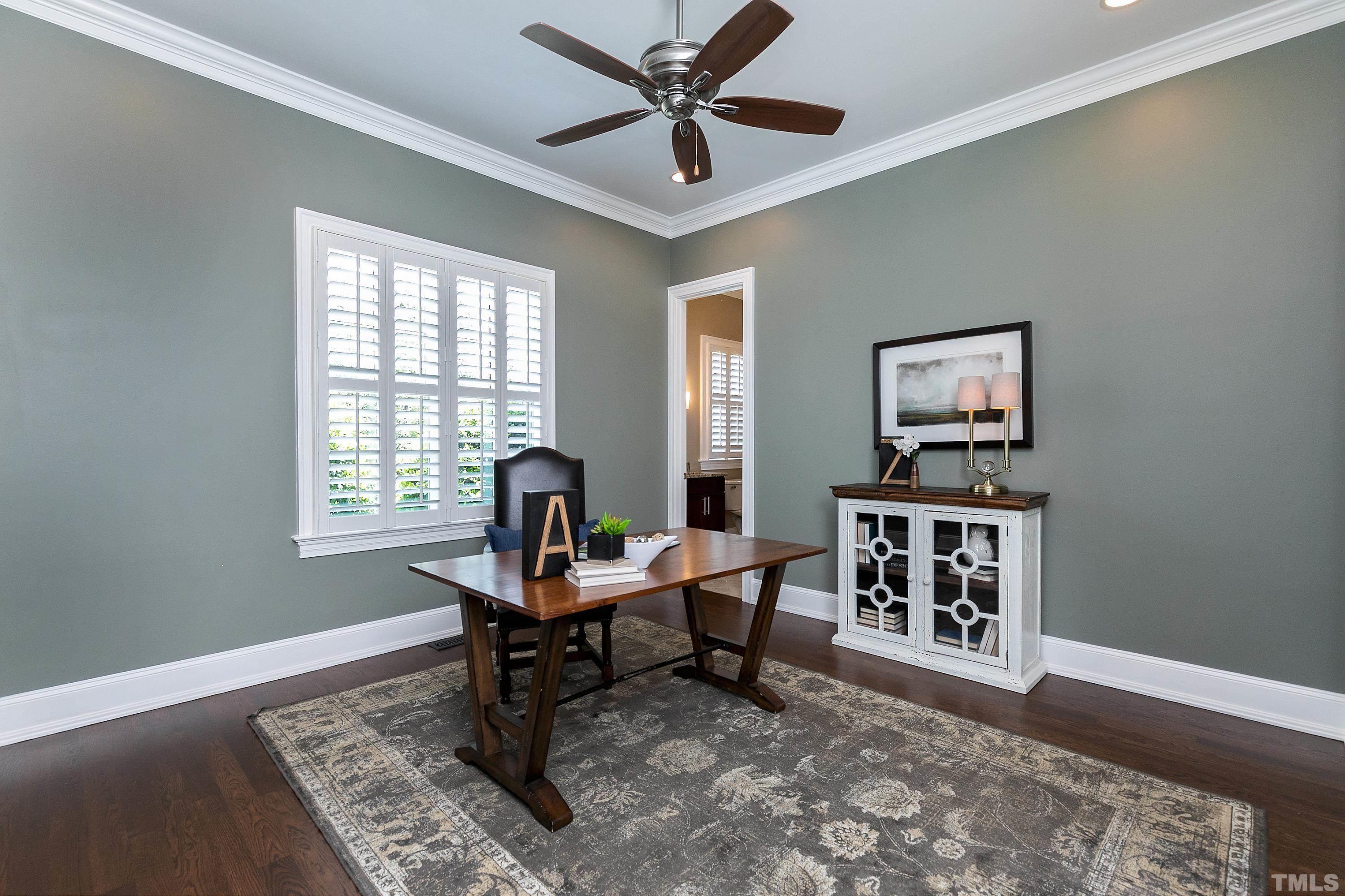 302 Michelangelo Way Cary, NC 27518 - Photo 22 of 44 a workspace with wooden floor and a window