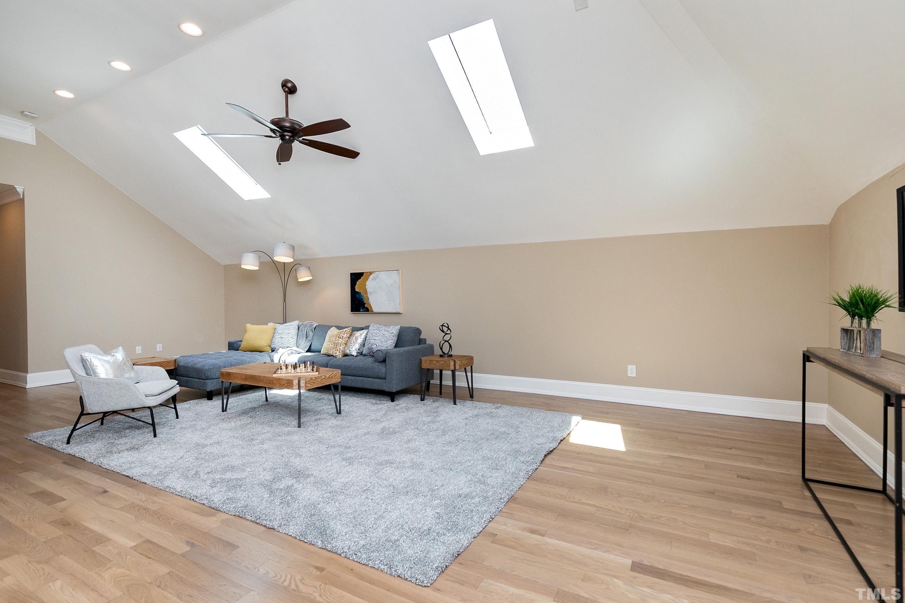 302 Michelangelo Way Cary, NC 27518 - Photo 32 of 44 a living room with furniture