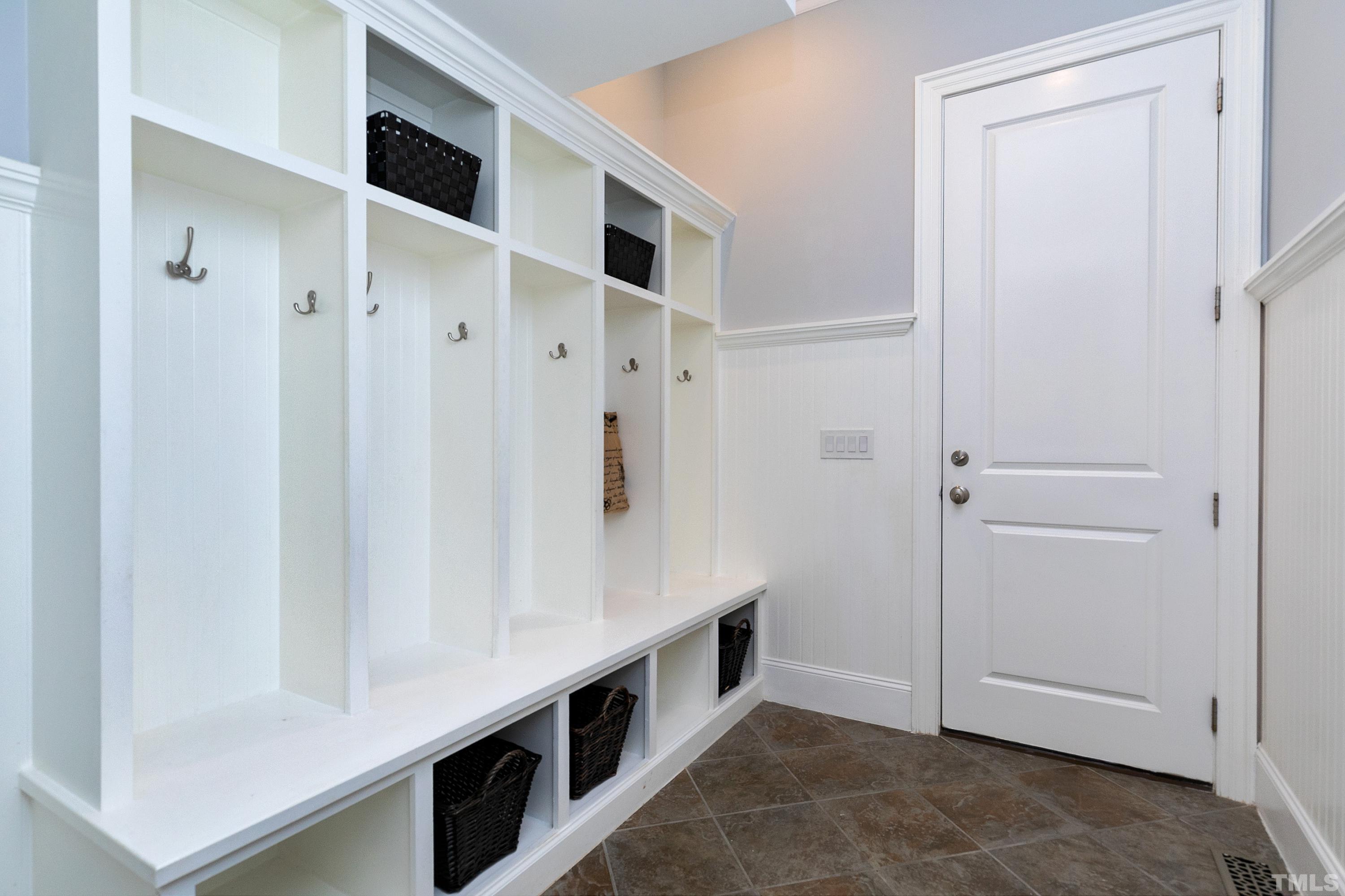 302 Michelangelo Way Cary, NC 27518 - Photo 33 of 44 a kitchen with stainless steel appliances a white and white cabinets
