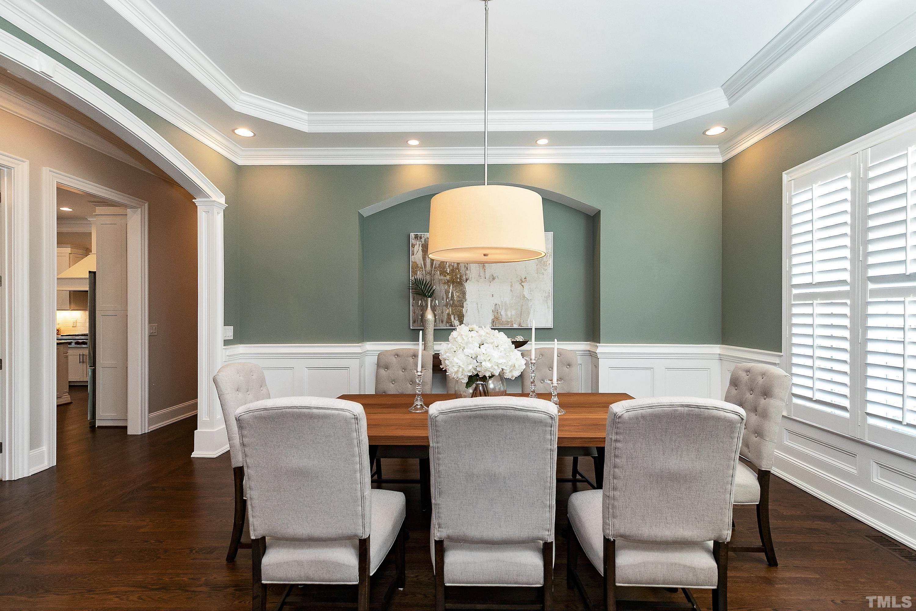 302 Michelangelo Way Cary, NC 27518 - Photo 4 of 44 a dining room with furniture window and wooden floor
