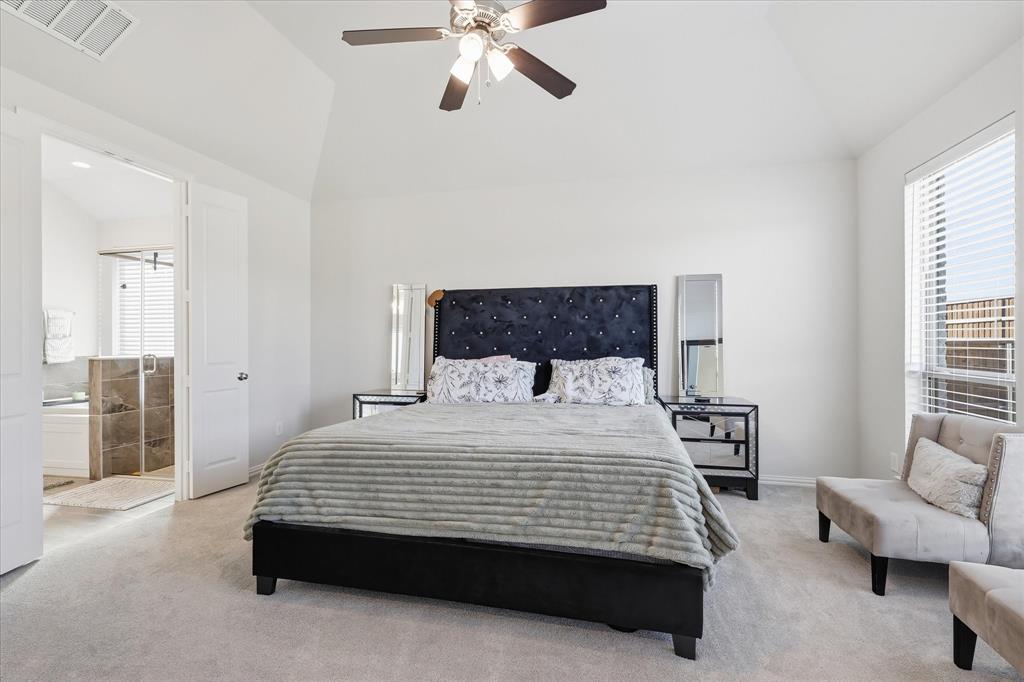 137 Chisos Court Rhome, TX 76078 - Photo 24 of 40 Vaulted ceiling with a ceiling fan, recessed lighting, and soft carpet flooring