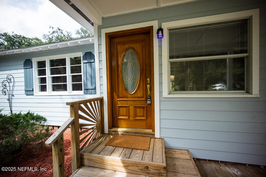 9965 Arnold Road Jacksonville, FL 32246 - Photo 13 of 60 a front view of a house with a window