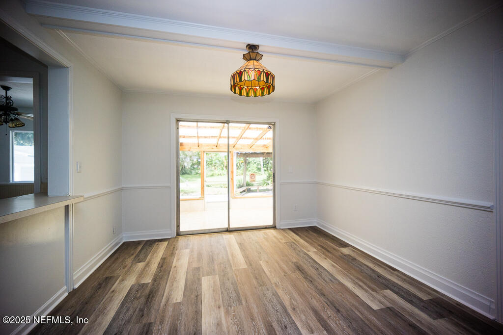 9965 Arnold Road Jacksonville, FL 32246 - Photo 17 of 60 a view of an empty room and window