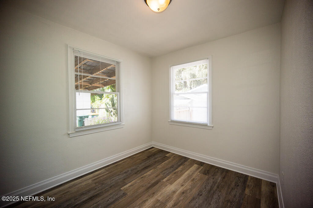 9965 Arnold Road Jacksonville, FL 32246 - Photo 33 of 60 an empty room with windows