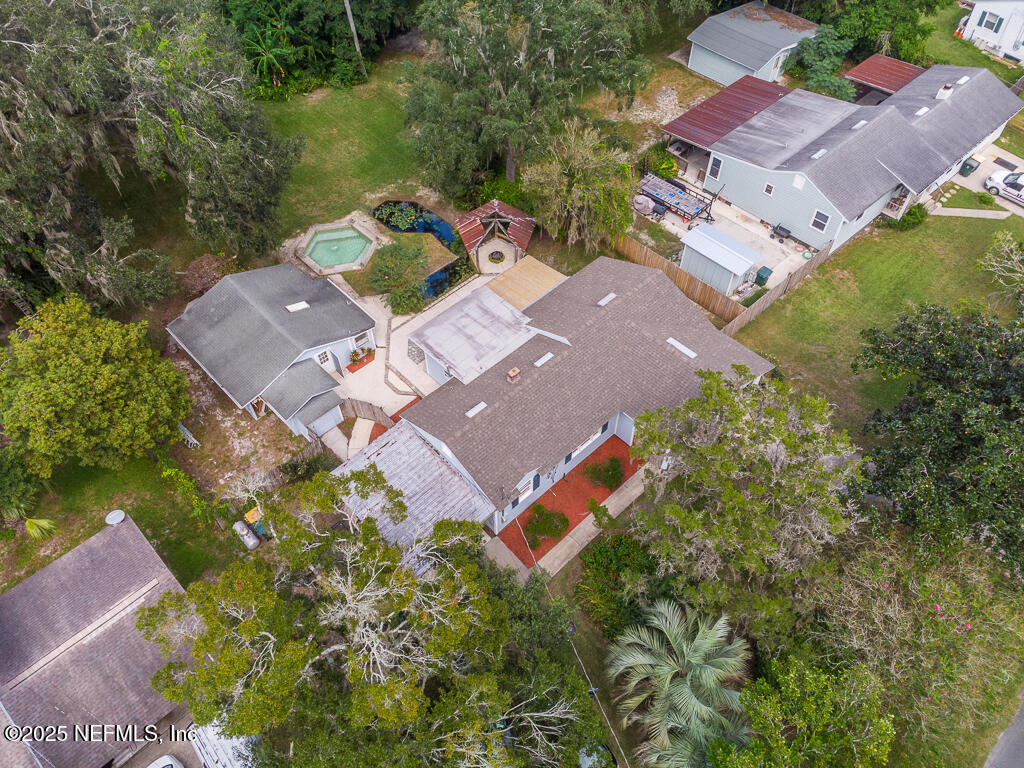 9965 Arnold Road Jacksonville, FL 32246 - Photo 4 of 60 an aerial view of a house with a garden