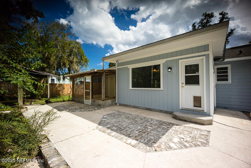 9965 Arnold Road Jacksonville, FL 32246 - Photo 44 of 60 a house with trees in front of it