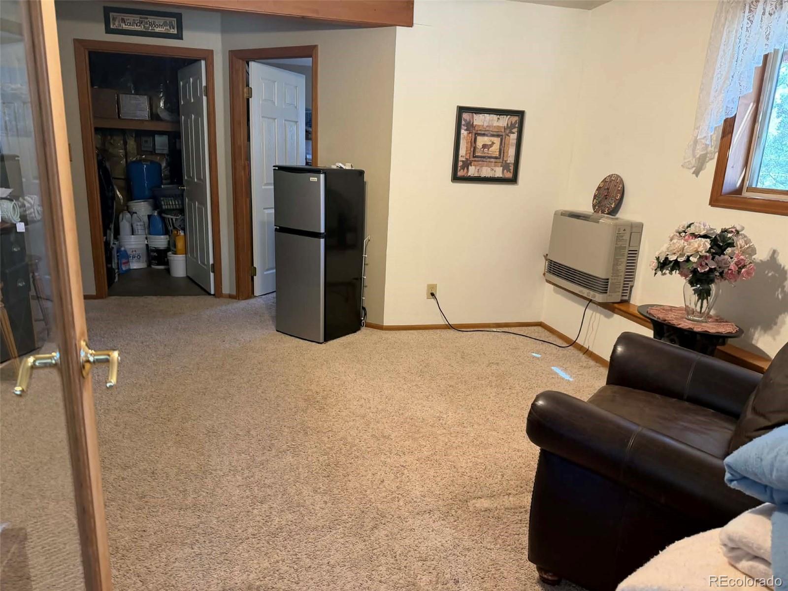 33623 Smith Road Pine, CO 80470 - Photo 16 of 45 a living room with furniture