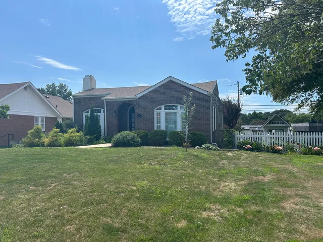 a house view with a garden space