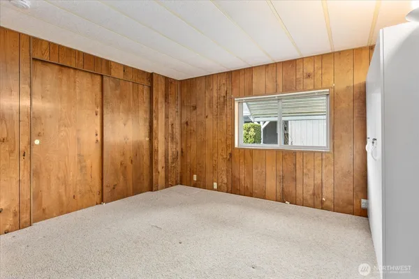 a view of a livingroom with a wooden door