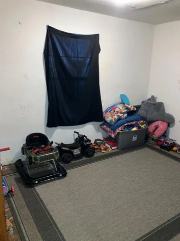 a view of a door with a couch