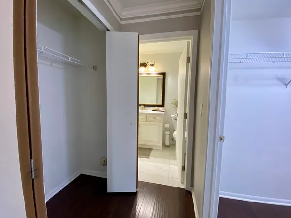 a view of a bathroom with a shower and a sink