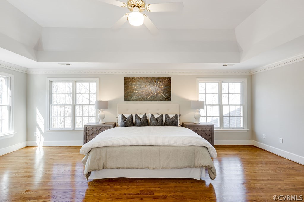 11902 Reeds Bluff Lane Midlothian, VA 23113 - Photo 27 of 42 a spacious bedroom with a large bed and a window