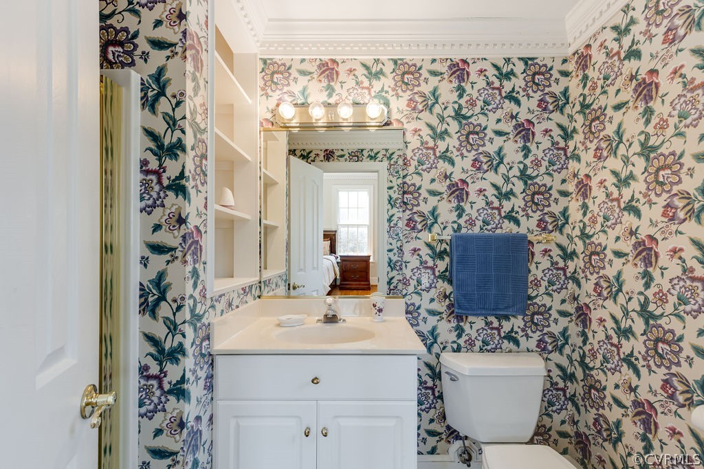11902 Reeds Bluff Lane Midlothian, VA 23113 - Photo 35 of 42 a bathroom with a sink and mirror with toilet