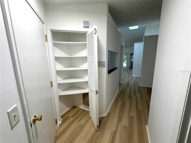 a view of a room with racks on the wall