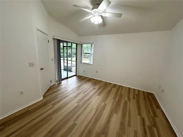 a backyard of a house with lots of green space
