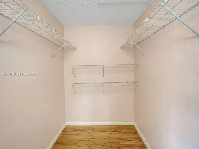 a view of a room with racks on the wall