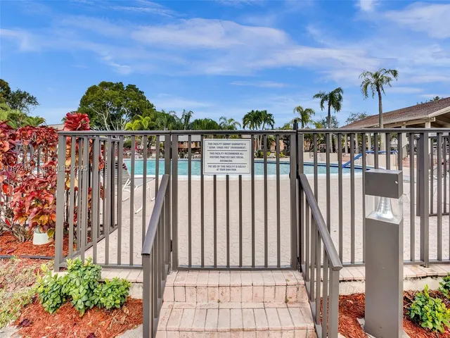 a view of a balcony with an outdoor space