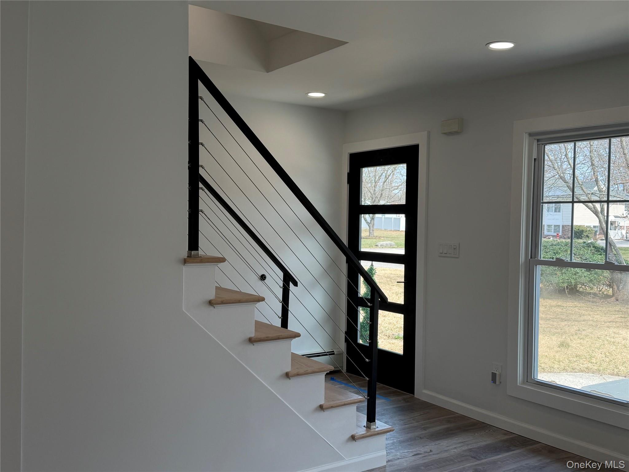 56 Pennaquid Road Coram, NY 11727 - Photo 20 of 29 Staircase with cable railings