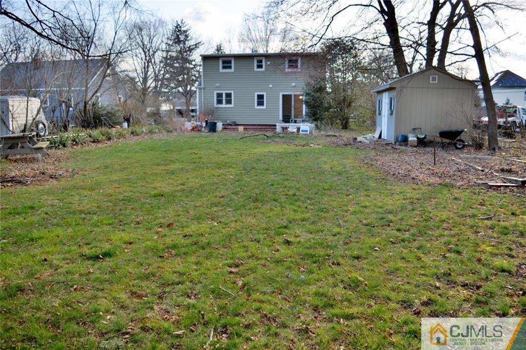 292 Georges Road Dayton, NJ 08810 - Photo 18 of 19 a view of a house with a yard