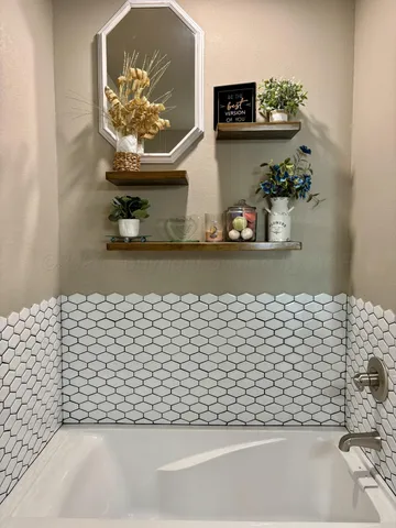 a bathroom with a bathtub