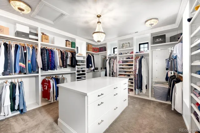 a view of a room with wooden floor and windows