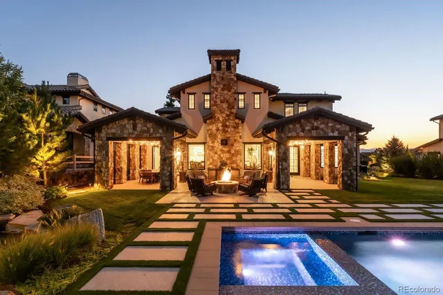 a front view of a house with swimming pool