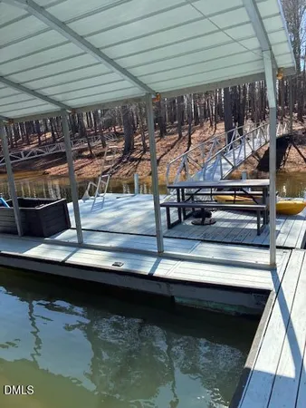 a view of a swimming pool with lounge chair