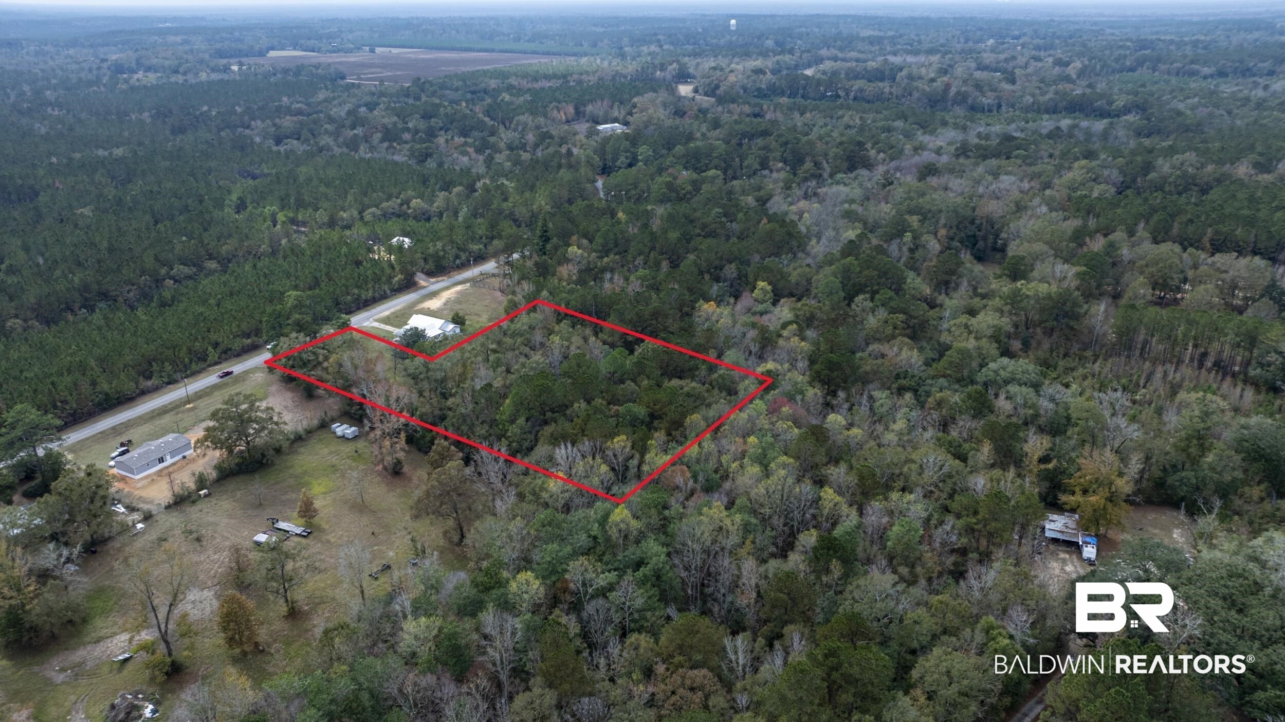 11753 Maytower Road Stockton, AL 36579 - Photo 4 of 8 Aerial view of property and surrounding area featuring property parcel outlined and a forest