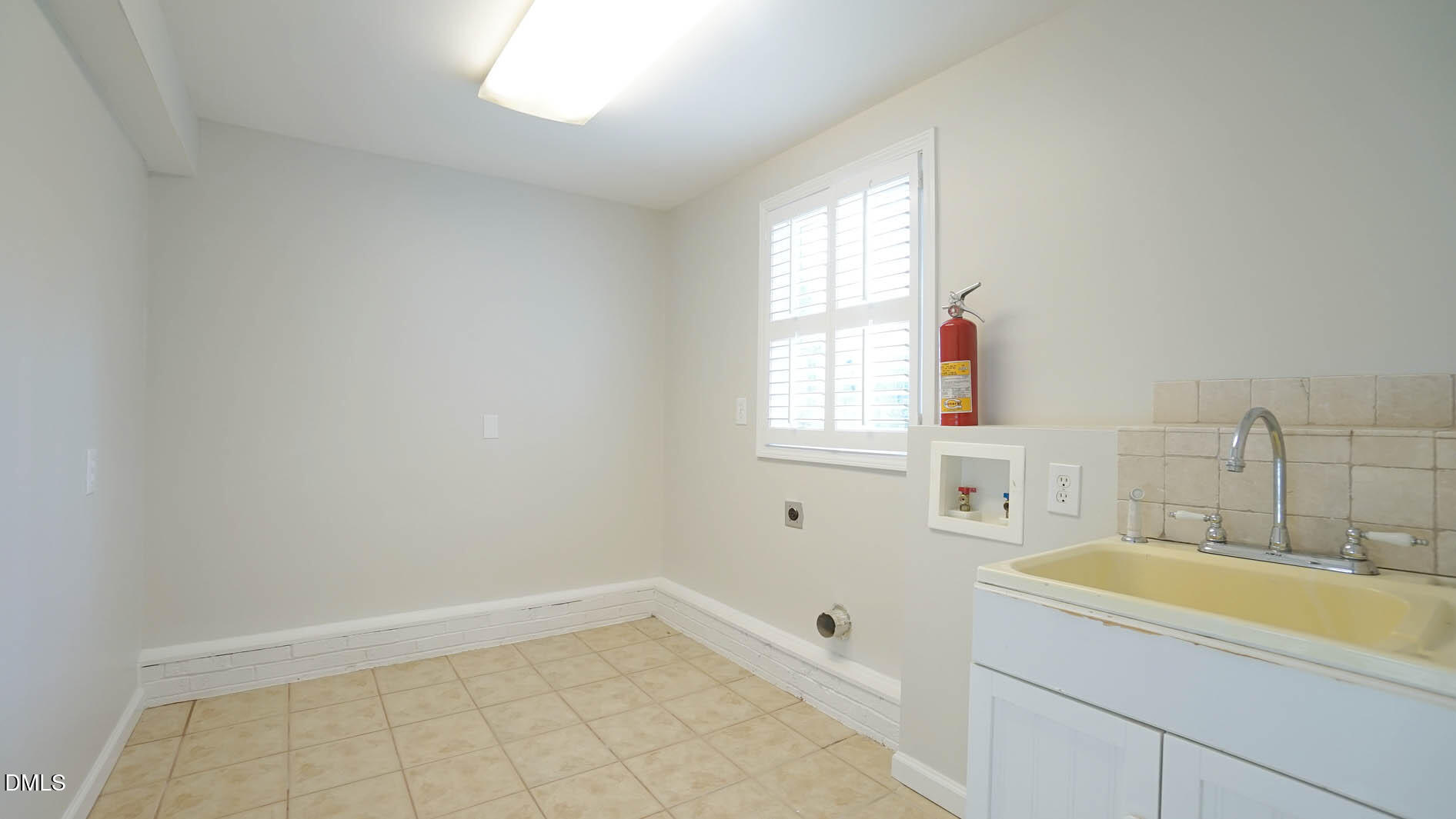8609 Timberwind Drive Raleigh, NC 27615 - Photo 30 of 62 Laundry Room