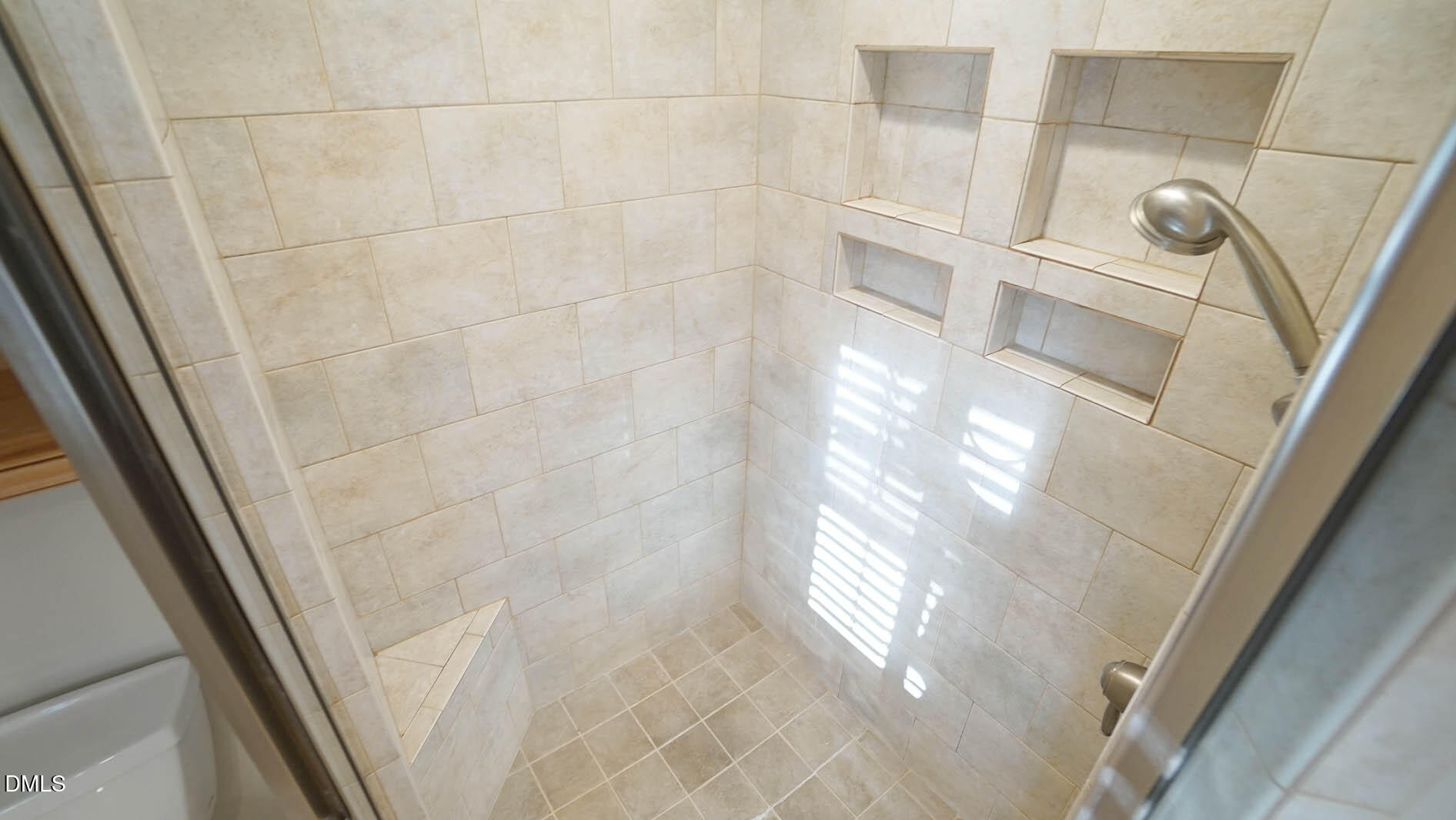 8609 Timberwind Drive Raleigh, NC 27615 - Photo 40 of 62 Walk in Tiled Shower