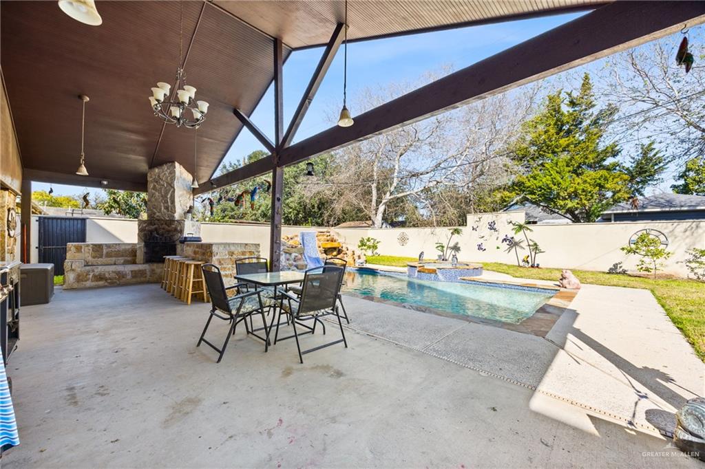 1811 Victoria Street Mission, TX 78572 - Photo 16 of 19 a view of a swimming pool with a patio